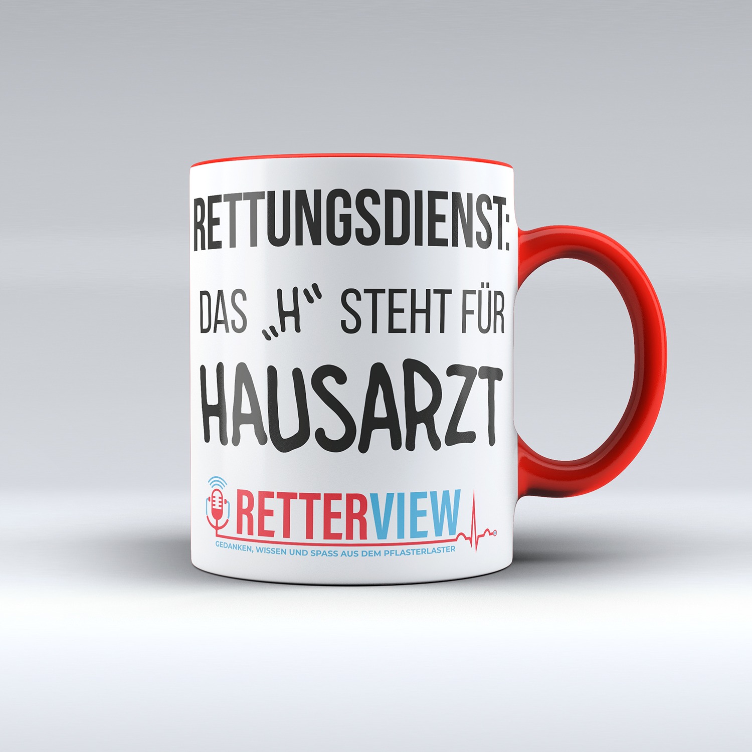 Weiße Retterview Tasse mit rotem Henkel / Rand und Aufdruck "Rettungsdienst das H steht für Hausarzt" und dem Retterview